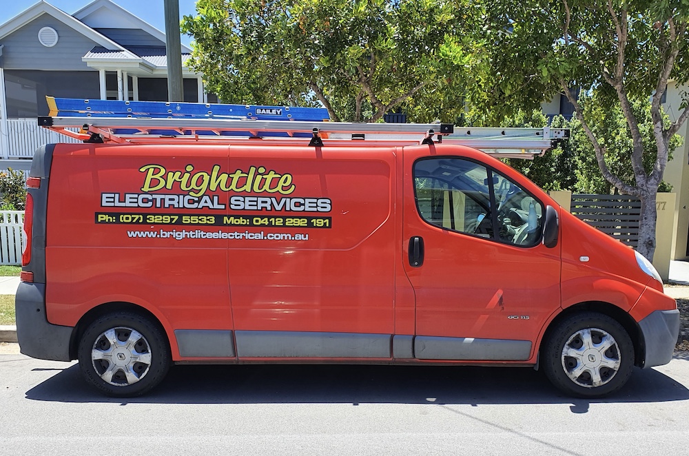 Brightlight Electrical Services logo on the side of a red van